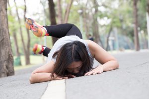 woman who stumbled and fell while jogging